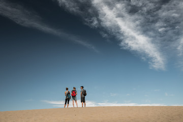 Hikers in the sandy desert