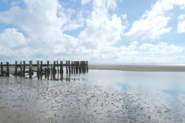 Fototapeta premium Wolken über dem Wattenmeer