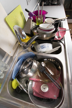 Dirty Dishes In A Kitchen Sink. 