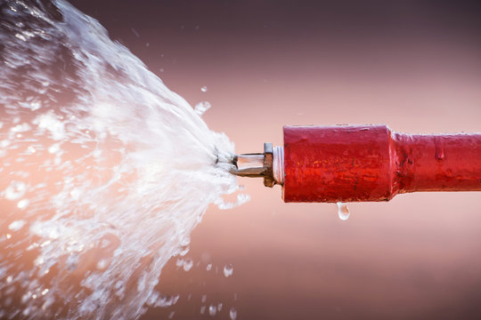 Fire sprinkler and red pipe.