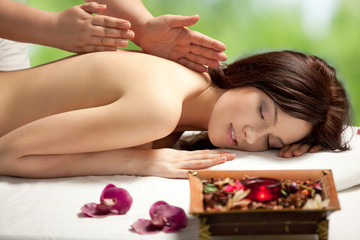Fototapeta na wymiar Chocolate massage, Enjoying in massage