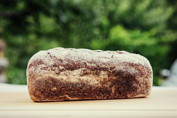 Brown bread dusted the flour.