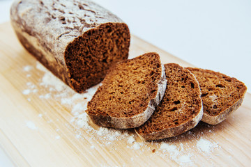 Sliced bread slices on a wooden table