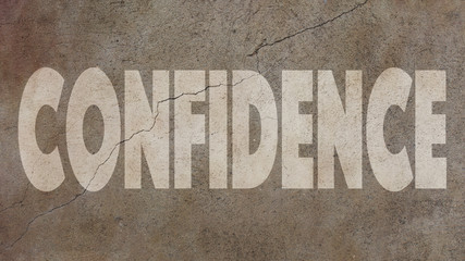 Confidence Written on a Cracked Concrete Wall