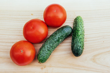 Wooden board with vegetables