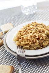 Fried cabbage with caraway and garlic on a plate