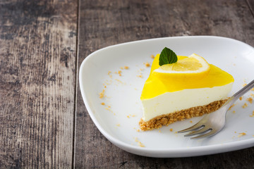Lemon pie on wooden background
