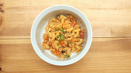 Macaroni fried with pork, tomato sauce top view