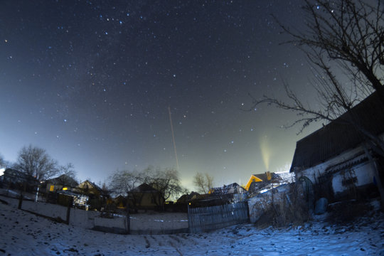 Night winter landscape in the countryside