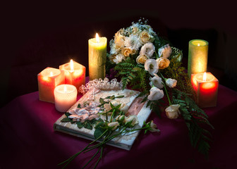 Wedding album for guests among flowers and candles