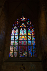 Stained glass window in St Vitus Cathedral in Prague