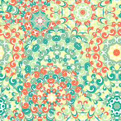 Fototapeta na wymiar Seamless colorful ethnic pattern with mandalas in oriental style. Round doilies with green, orange and yellow curls and swirls weaving in arabesque traditional lace ornament. Vector illustration.