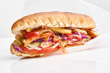 close up of kebab sandwich on white background..