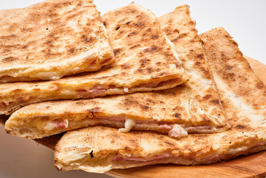 Toasted sandwich with cheese and ham..
