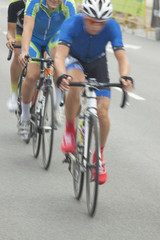 Fototapeta na wymiar Racing Cyclists, Motion Blur