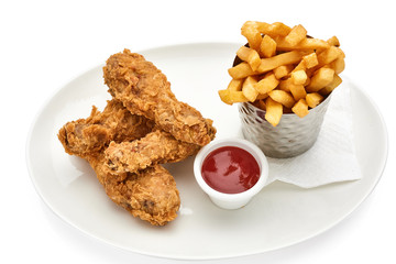 hot fried chicken wings in basket isolated on white background..