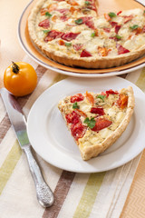 Tart with salted sheep cheese and tomatoes