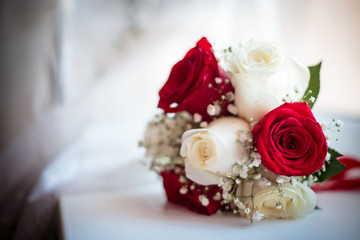 Wedding bouquet with red and white roses