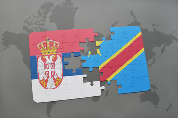 puzzle with the national flag of serbia and democratic republic of the congo on a world map