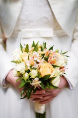 Wedding bouquet in hands
