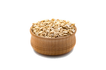 Raw Oatmeal in a wooden bowl