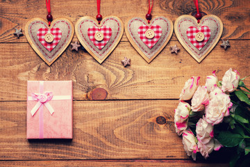 Roses, heart shapes and gift box 