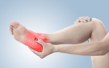 Pain in the foot. Massage of female feet.