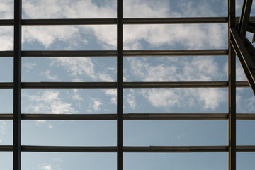 Incomplete ceiling steel structure and blue sky