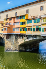 Fototapeta na wymiar Bridge Ponte Vecchio (1345) on Arno River in Florence, Italy.