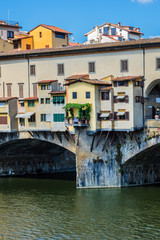 Fototapeta na wymiar Bridge Ponte Vecchio (1345) on Arno River in Florence, Italy.