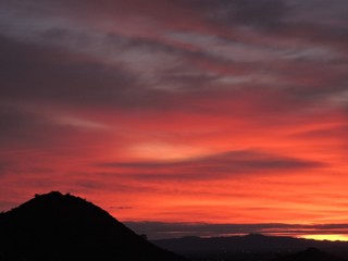 Fire looking sunset on mountains