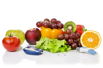 Obraz na płótnie Canvas glucometer for glucose level and healthy organic food