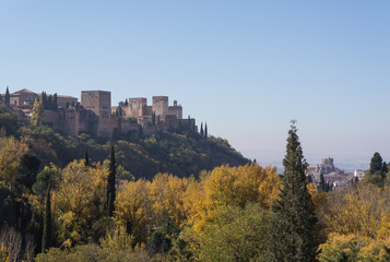Fototapeta na wymiar Alhambra Granada, Spain, panoramic views from a viewpoint, beneath the forest with autumn colors