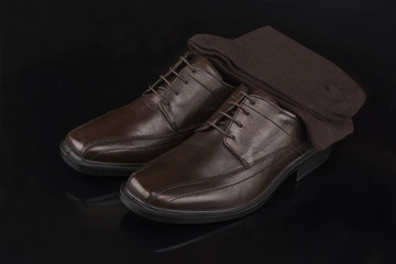 Brown men's shoes and socks
