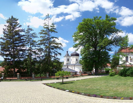 Capriana monastery on the background the stone church, built in Moldavian style by Moldavian Prince Stephen the Great, Moldova, Straseni