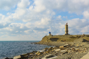 The lighthouse at Cape Utrish Dolphinarium in the Black sea. Russia, Krasnodar Krai, village of Big Utrish