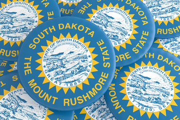 US State Buttons: Pile of South Dakota Flag Badges, 3d illustration