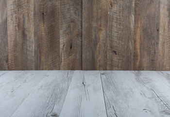 White rustic wooden table with brown wood background and copy space