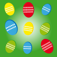 Easter eggs on green background
