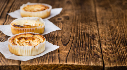 Fresh made Cheesecake on a rustic background