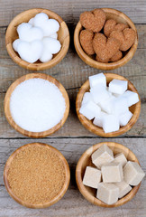 Fototapeta premium Bamboo bowls with sugar on table