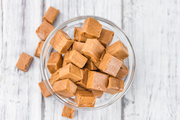 Wooden table with Caramel (selective focus)