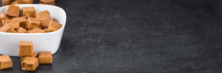 Portion of Caramel pieces on a slate slab