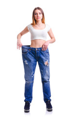 Young Girl in blue jeans large size on a white background