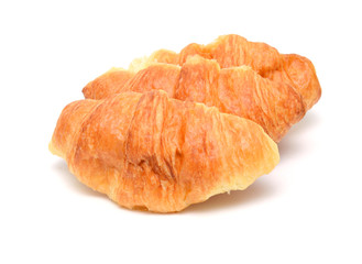 Fresh and tasty croissant on the white background