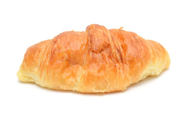 Fresh and tasty croissant on the white background