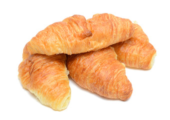 Fresh and tasty croissant on the white background