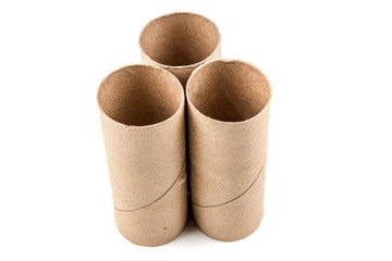 Several empty toilet paper rolls isolated on a white background