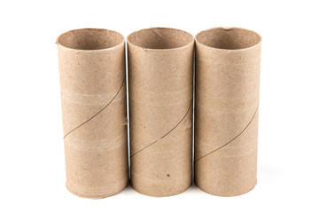 Several empty toilet paper rolls isolated on a white background