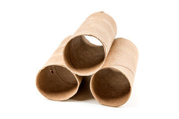 Several empty toilet paper rolls isolated on a white background